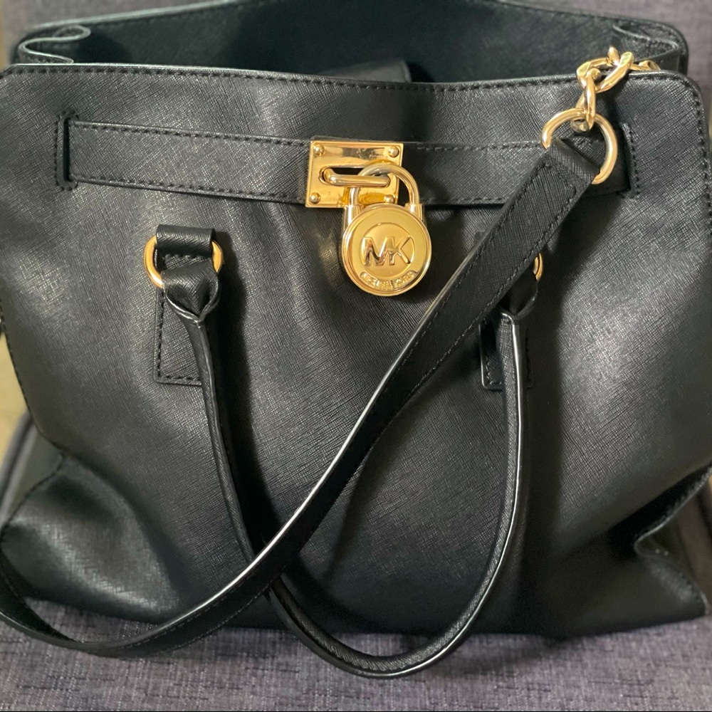 Gently used Micheal Kors large leather purse